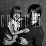 30-11-2004 Antonie Kamerling with his kid at studio Amsterdam, 
by order of J/M Vaders

[keywords]Eyecontact, Smiling, Posed, Half Length, Black and With Image[/keywords]